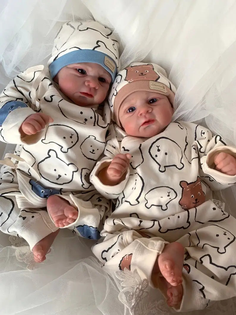 Jude and June awake, with their hands near their faces