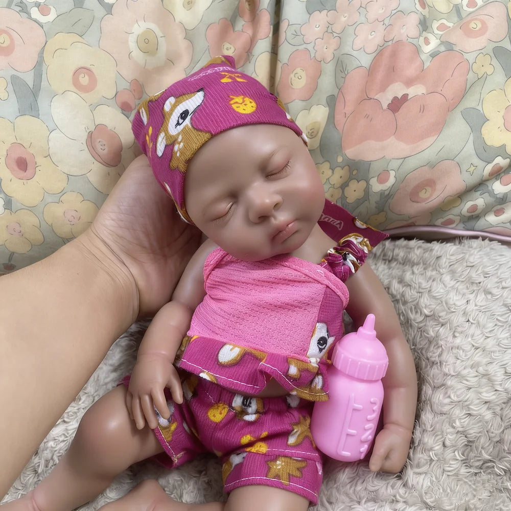 Nia with a hand behind her head, showing her small size