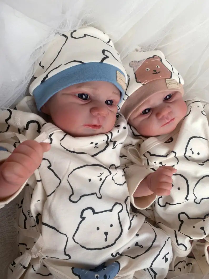 Jude and June close together in matching bear-print outfits